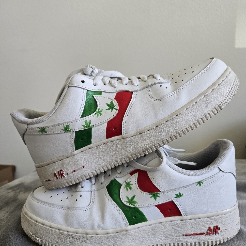 Nike White Low-Top Sneakers with Green & Red Leaf Accents